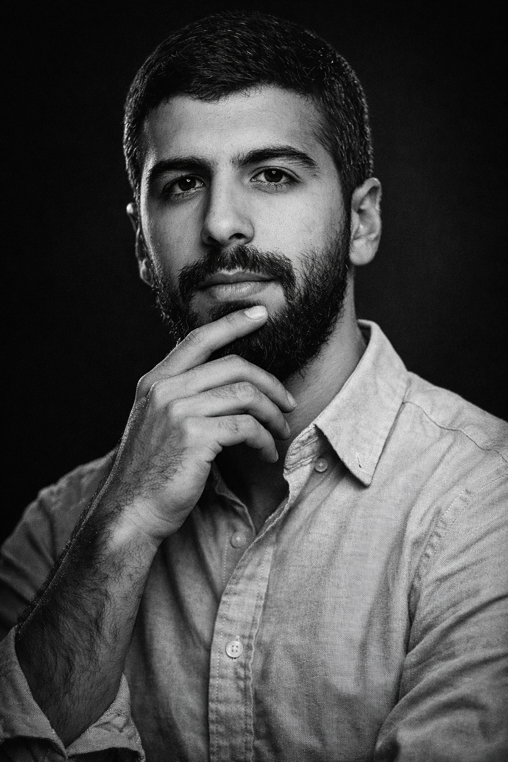 oussama_batouche_profile_bw_portrait.png