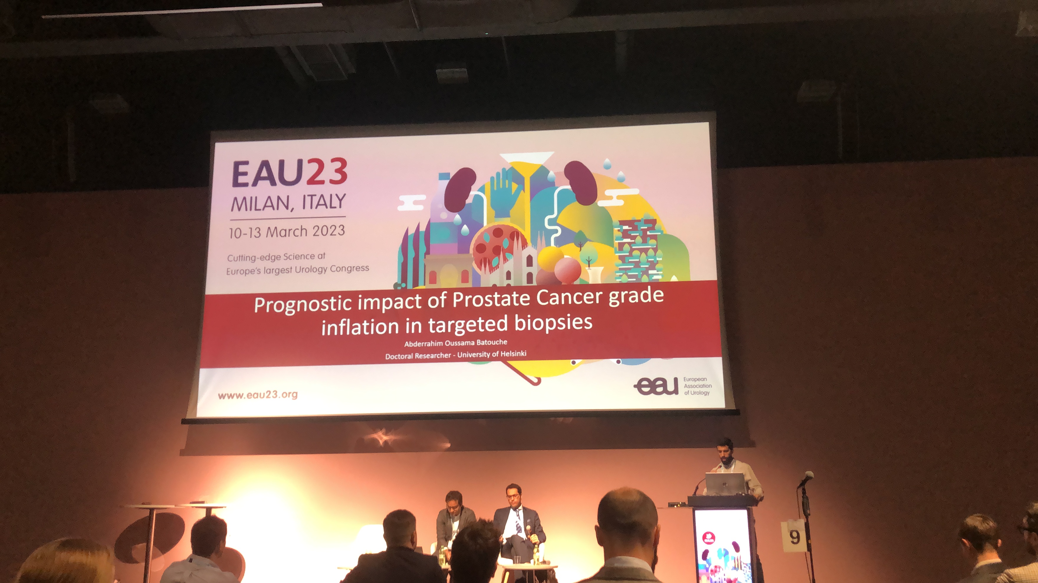 Oussama Batouche presenting prostate cancer grade-inflation research at EAU 2023 in Milan, Italy.